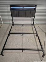 Full view of assembled metal frame and headboard