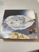 Printed retail box showing image of crystal bowl, confirms inclusion of box