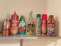 All seven containers lined on shelf