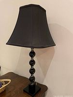 Full view of lamp showing shade, column and base