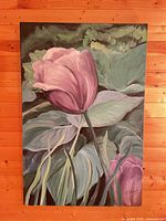 Front view of entire floral oil painting on wooden wall