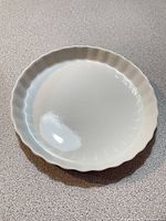 Top view showing interior glaze and fluted rim