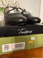 Shoes on original Trotters box showing size label 9N Jamie Black