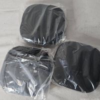 Three sealed Anker speakerphones top view