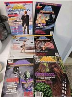 Six Star Wars Insider magazines laid out showing front covers and issue numbers