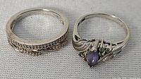 Two sterling silver rings side by side