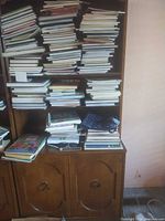 Front view of bookshelf filled with books (books excluded from sale)