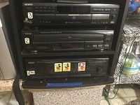 Stacked audio equipment: Sony CD player CDP-CE535 on top, TEAC CD player PD-D1200 in the middle, TEAC double cassette deck W-528R at the bottom.