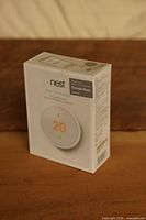 Front three-quarter view of sealed Google Nest Thermostat E retail box