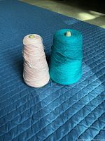 Both yarn cones side by side showing colors and size