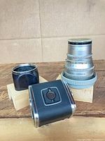 Lens, hood, and A12 back grouped together