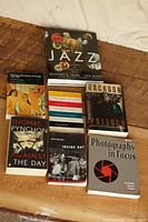All seven books front covers visible