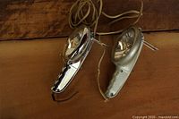 Both handheld auto lights side by side showing finishes and cords