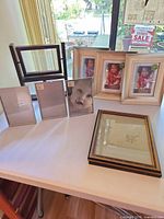 Group shot of all picture frames on table