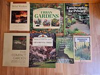 All seven paperback books laid out front covers visible