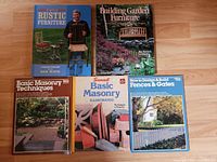 All five books laid out showing front covers