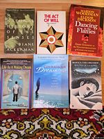 All six paperback books front covers visible