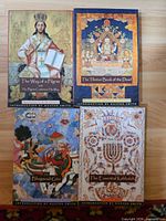 Group shot of all four paperback books laid out