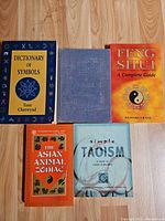 Top view of all five books showing covers and formats
