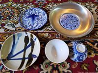 Group shot of all five items on rug
