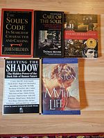 All five paperback books front covers visible