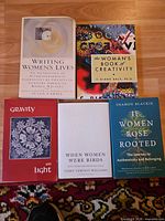All five books laid out showing front covers