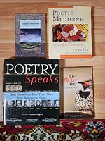 Four of five poetry books laid out: Conamara Blues, Poetic Medicine, Poetry Speaks with CDs, The Flicker Tree