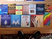 All ten books laid out showing fronts