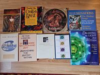 Group shot of all nine paperback books laid out