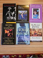 Group shot of all six paperback books