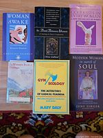 All six paperback books laid out, showing fronts