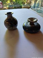 Both bud vases full view