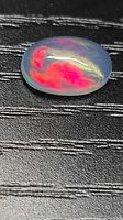 Top view of opal showing red and green play-of-color