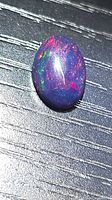 Front view of the opal showing play-of-colour