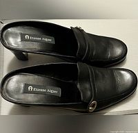 Top view showing labels, leather condition, and pair completeness