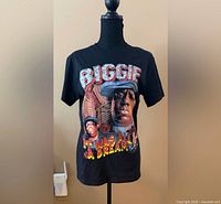 Front view of black Biggie graphic T-shirt on mannequin