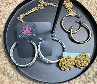 All four jewellery items displayed on stand