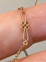 Close-up of decorative openwork link on bracelet