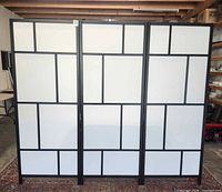 Front view fully extended showing three panels and grid design
