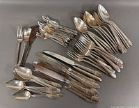 All pieces spread out showing variety of utensils