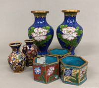 group shot showing all seven cloisonné pieces