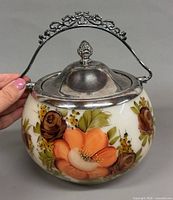 Front view showing floral design and handle