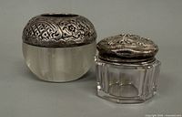 Both sterling silver and glass pieces side by side for scale and detail