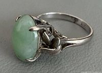 Side profile of ring showing jade stone and setting detail