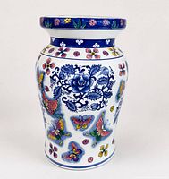 Full frontal view of porcelain garden stool showing decoration