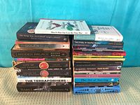 Two stacks showing all 25 books front view