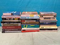 Two columns of stacked books showing full lot