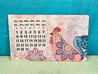 front view showing full calendar grid and rooster artwork