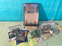 Front view of box, map board, rulebooks, bagged components