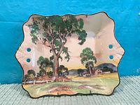 Front of Royal Doulton decorative plate showing landscape design